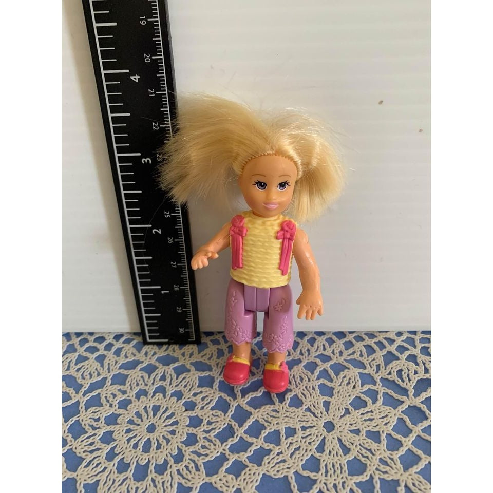 Fisher price loving family Girl Sister with Yellow Shirt & Purple Shorts Doll