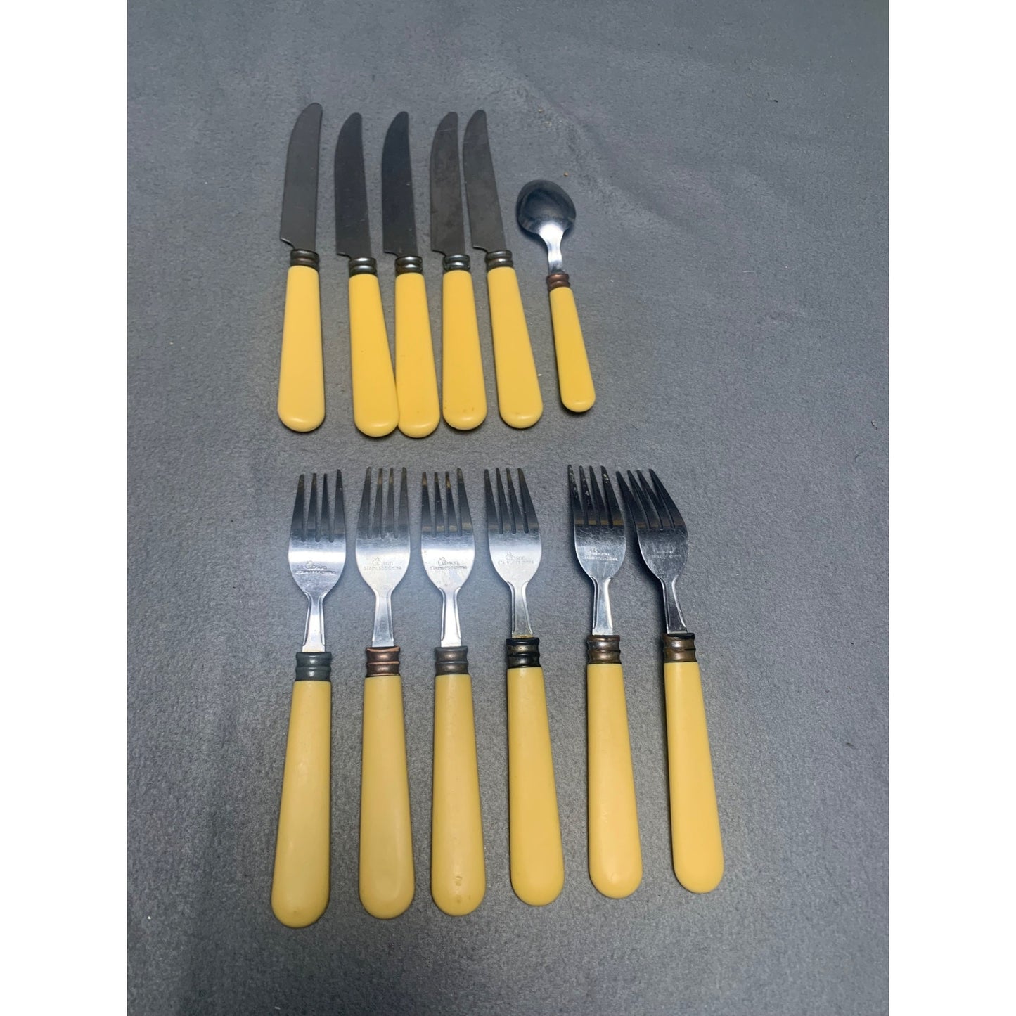 Vintage Gibson Yellow Handle Silverware Set 12-Piece Stainless Steel Flatware